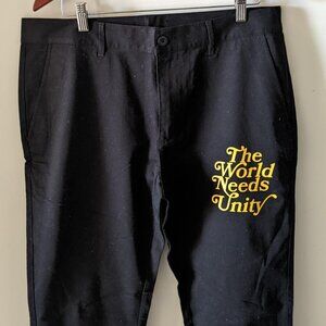 Black & Yellow The World Needs Unity Trousers